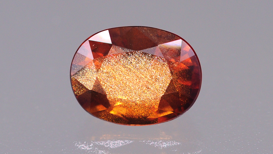 Unique Orange Sapphire with Golden Sheen Effect Reportedly from Kenya